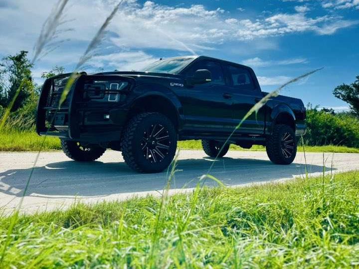 Black Ford F-150 pickup