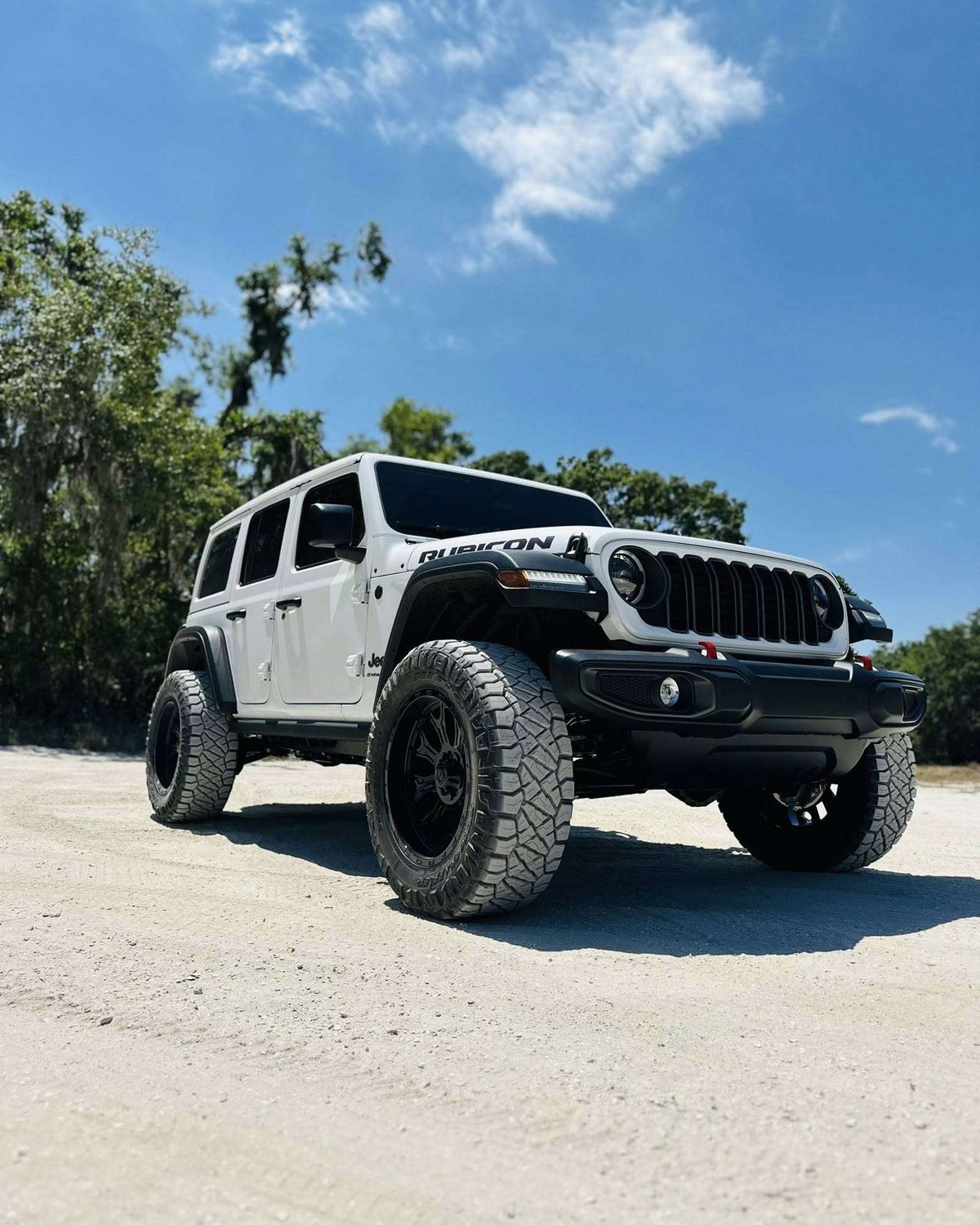 White Jeep Wrangler serviced at Superior Auto & Offroad